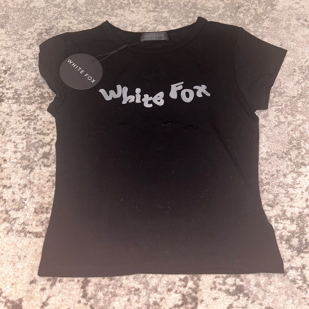 small Black and silver White fox fitted tee. Never worn brand new with tags.